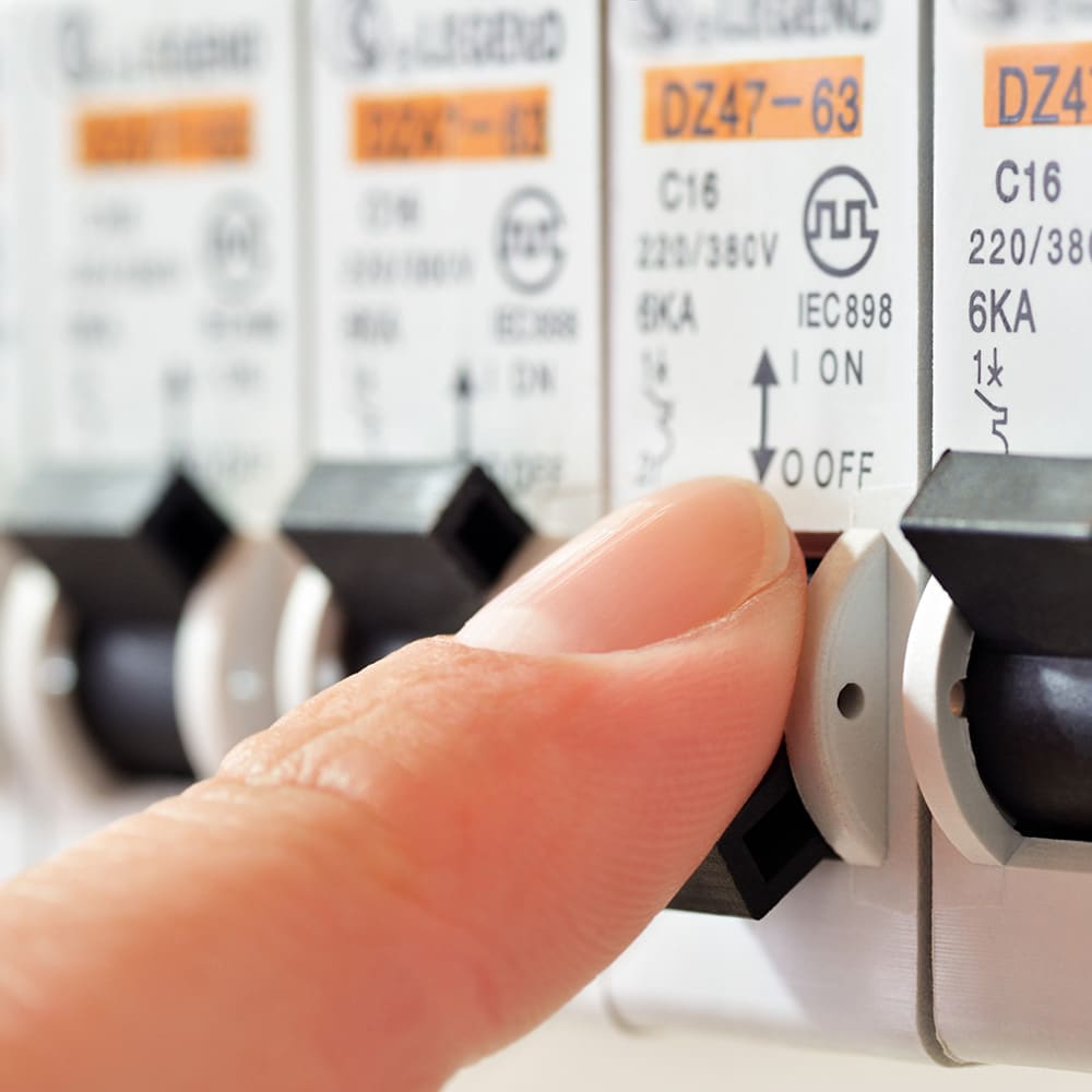 consumer-unit-mcbs Customer switching an mcb on a consumer unit.